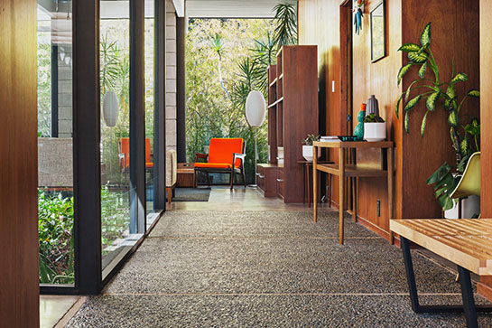 A welcoming entry in Plan VC-584 by Claude Oakland, AIA, with original mahogany paneling Photo: Brad Tucker, Eichler Homes