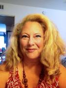Angie Agostino, E-News Art Director